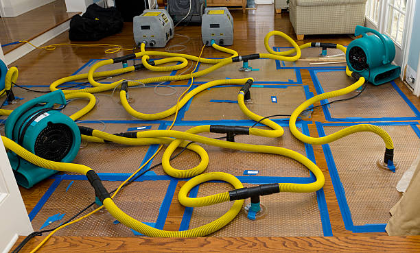 Professional Flood Damage Restoration technician working in Cuyahoga Falls, OH